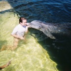 Pacs the dolphin gives Dessy a kiss!